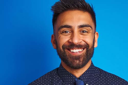 general dentistry man in tie blue background