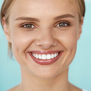 close up of woman smiling to show dental implants from dental implants services sugar land tx