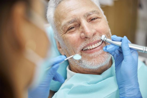 man getting dental exam