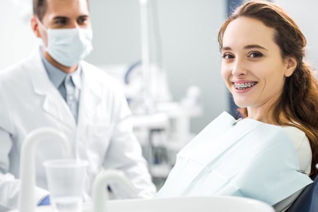 3 Benefits of Adult Orthodontic Services patient at dentist for adult orthodontics