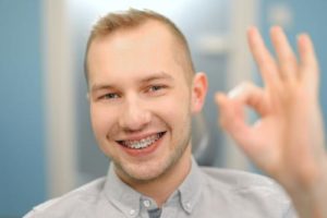 man gets new orthodontics 